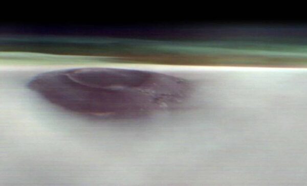 NASA’s Mars Odyssey Captures Stunning View of Martian Landscape Breaking Through Cloud Cover