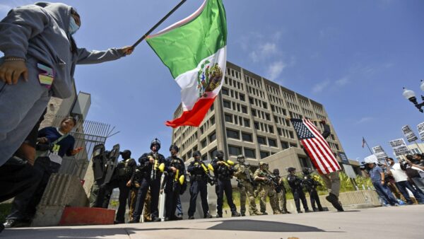 Nationwide Protests Erupt Over Immigration Raids Amidst Escalating Tensions