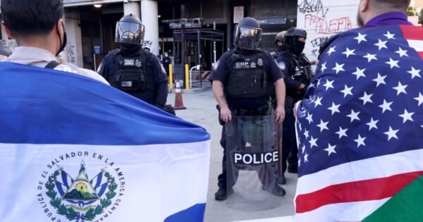 Demonstrators in Downtown L.A. Wave Flags of Heritage Amid Immigration Protests