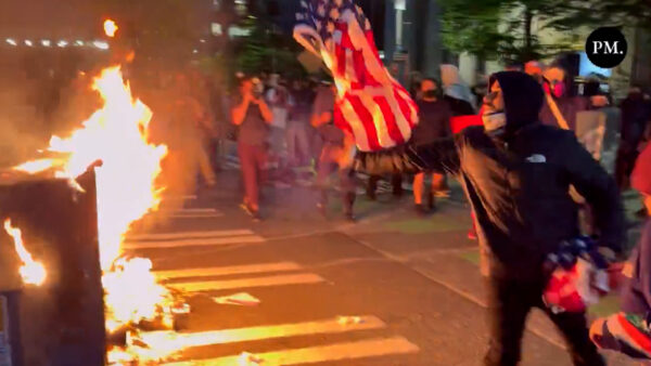 Confrontation Erupts as Man Saves American Flag from Protesters in Seattle