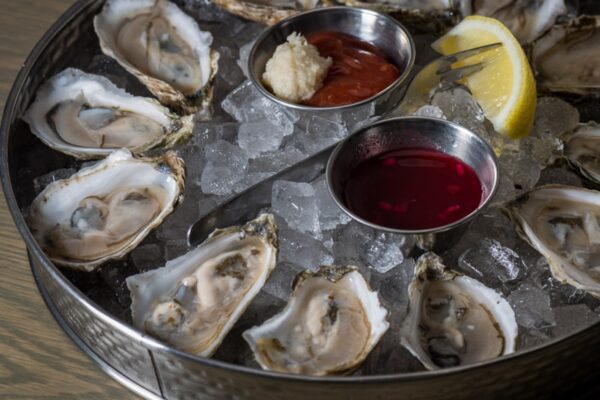 Boston’s Summer $1 Oyster Specials: Where to Savor Fresh Shellfish by the Water