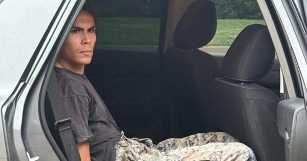 Activist Indicted for Distributing Face Shields During Protests Against Immigration Raids